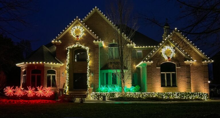 Warm white lights, wreaths and garland on a Virginia home